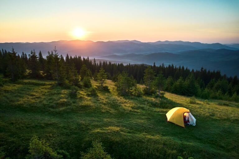 Tent at sunset in the mountains